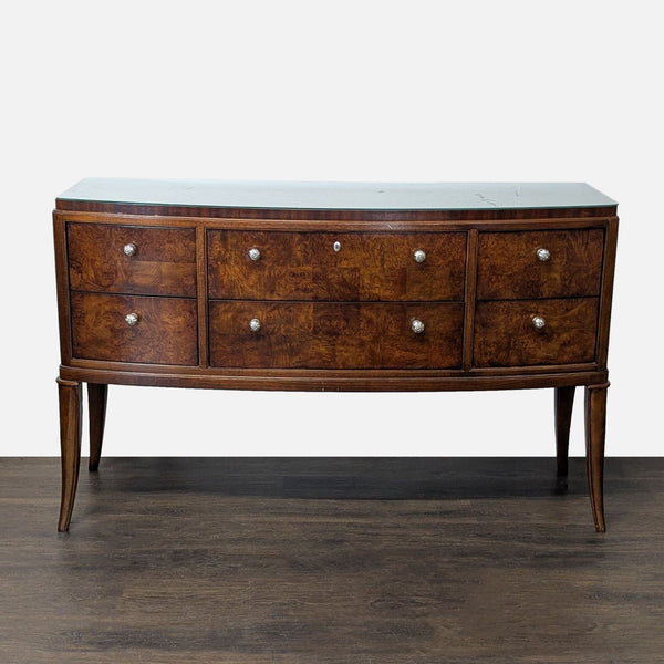 Thomasville bow-front sideboard with burl veneer drawers, serpentine shape, and six storage drawers.