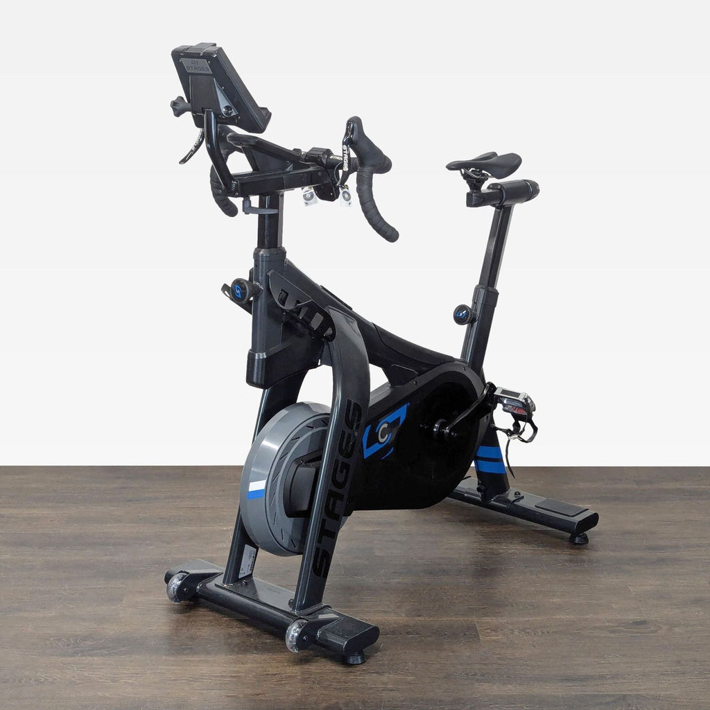 Black Stages Cycling spin bike for home or gym use, featuring comfort adjustments and sturdy construction.