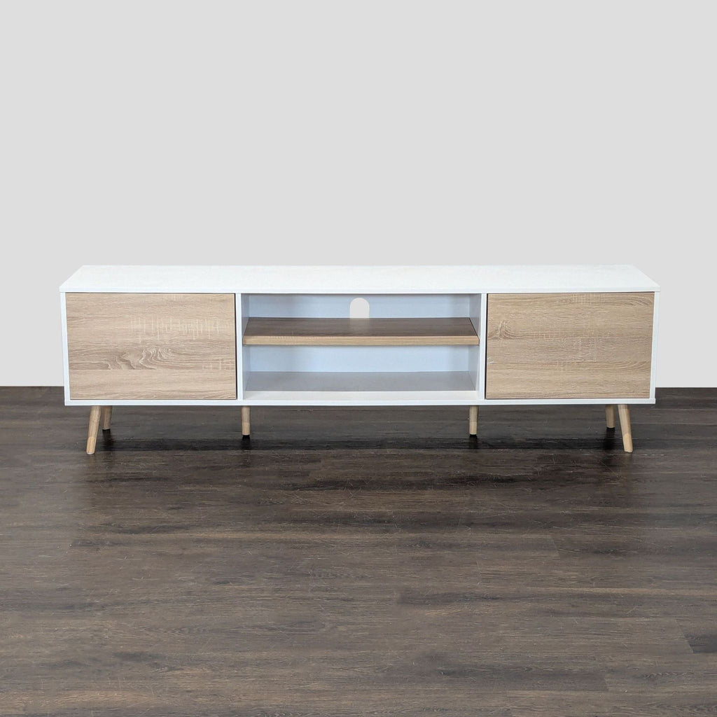 Modern white and oak Wampat media console with two cabinets, open shelf, and cable management holes.