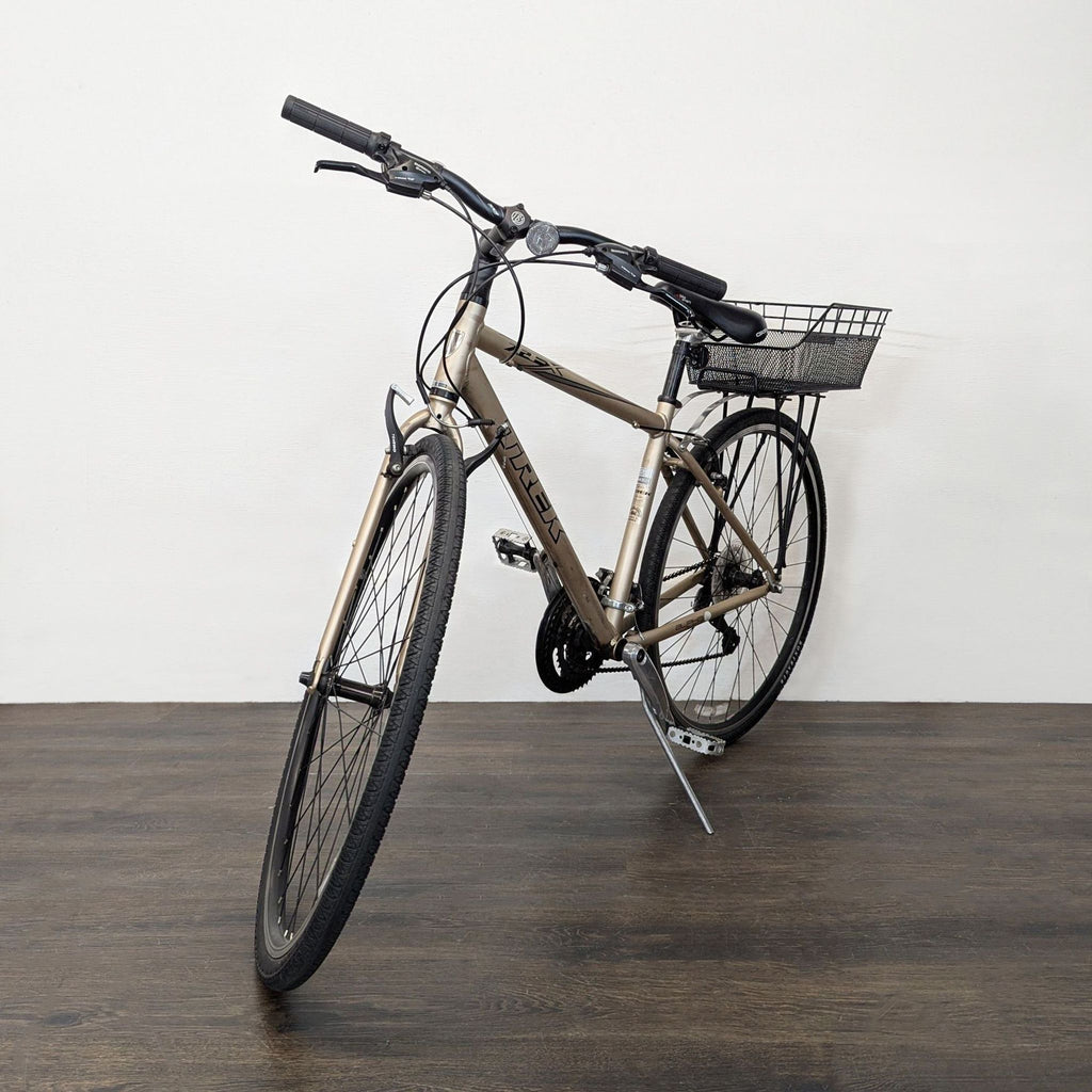 Trek 7.2 FX hybrid bike shown from the side, featuring black frame and standard wheels.