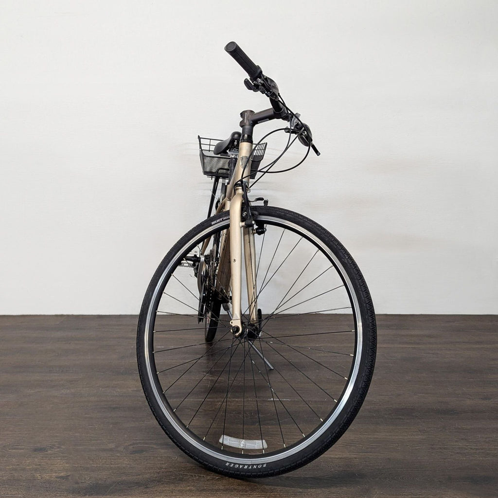 Trek brand 7.2 FX bicycle photographed upright, clearly showing pedals, seat, and handlebars.