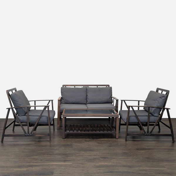 Orchard set with a sofa, two armchairs, and coffee table in dark wood and gray cushions, ideal for patios.