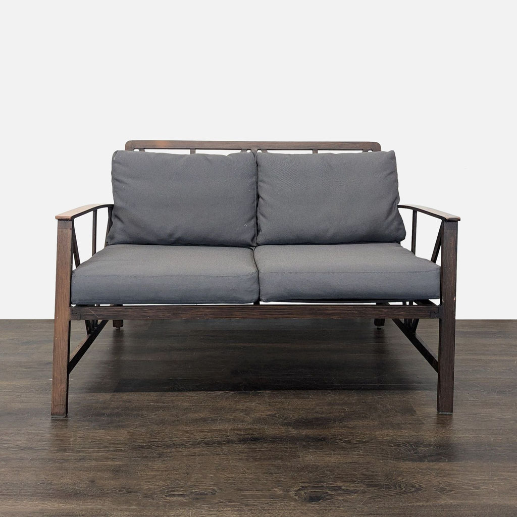 Orchard brand furniture set featuring a sturdy coffee table, cushioned seating, and sleek dark wood frames.