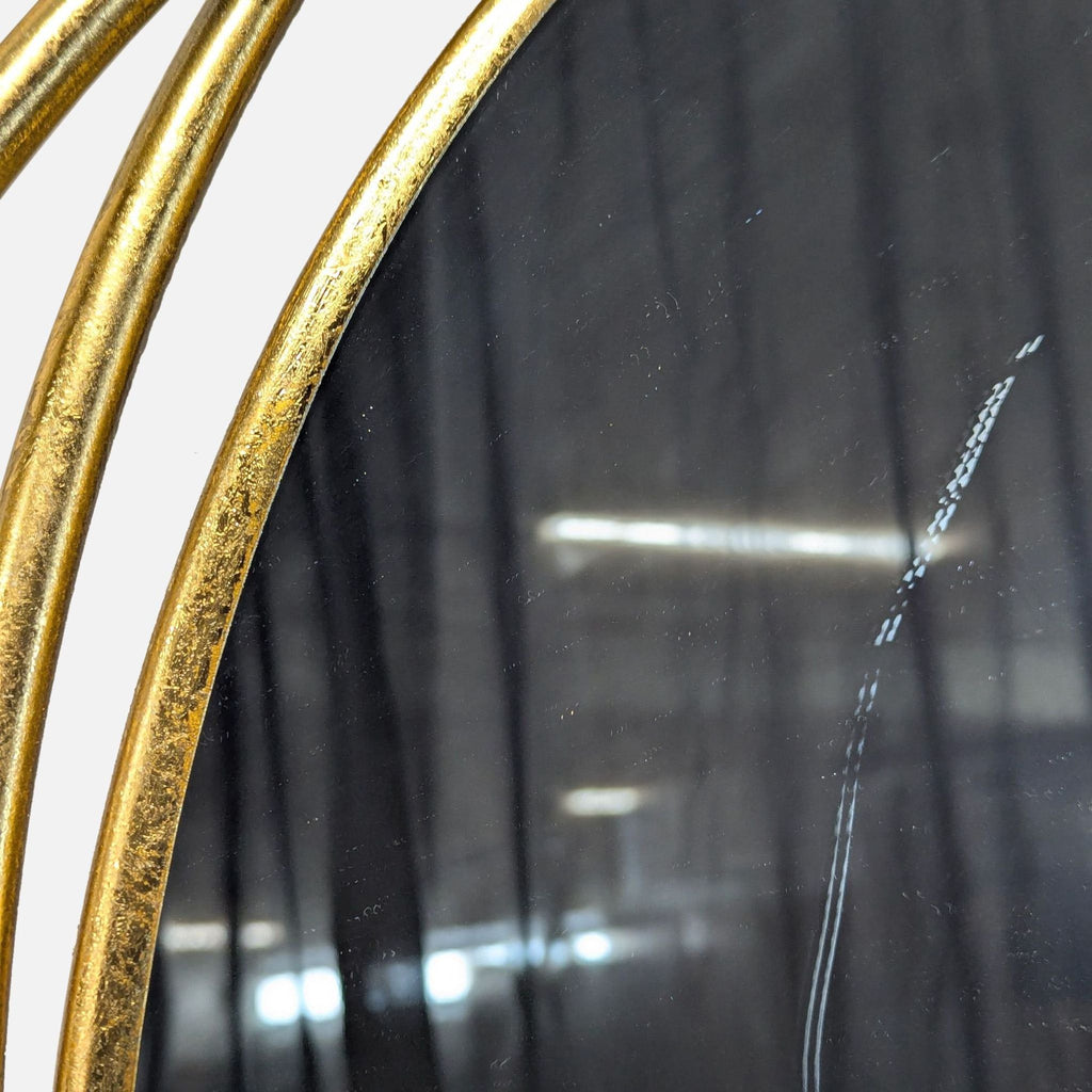 UMA Gold Metal Room Wall Mirror with Overlapping Circles