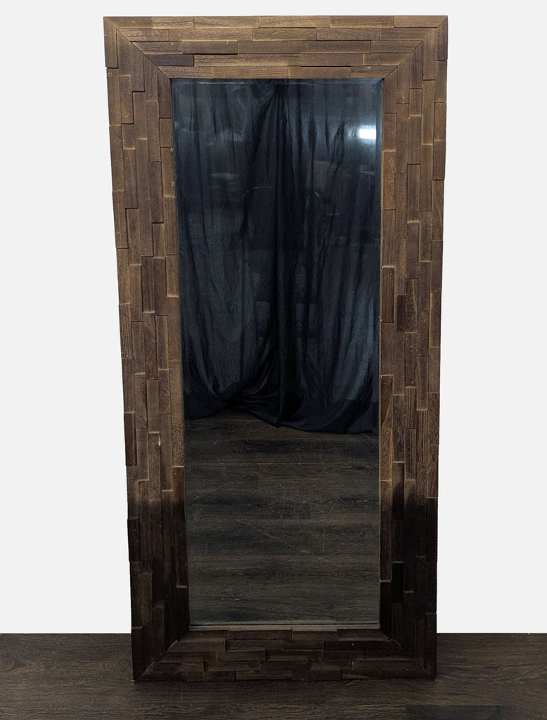 1. Decorative mirror with a three-dimensional wooden frame featuring geometric patterns.  