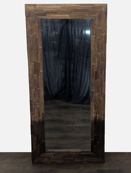 1. Decorative mirror with a three-dimensional wooden frame featuring geometric patterns.  