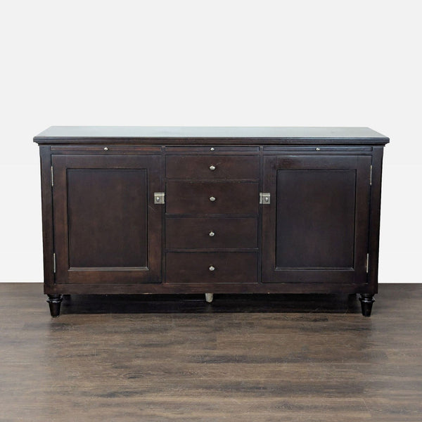 Bernhardt sideboard in dark wood with four drawers, two cabinets, and pull-out trays for ample storage.