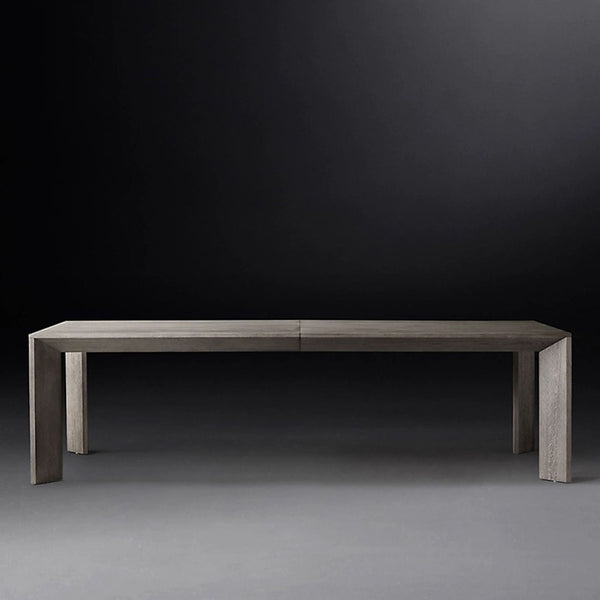 Restoration Hardware dining table with clean lines, angled legs, and 2 leaves extending to 140 inches.