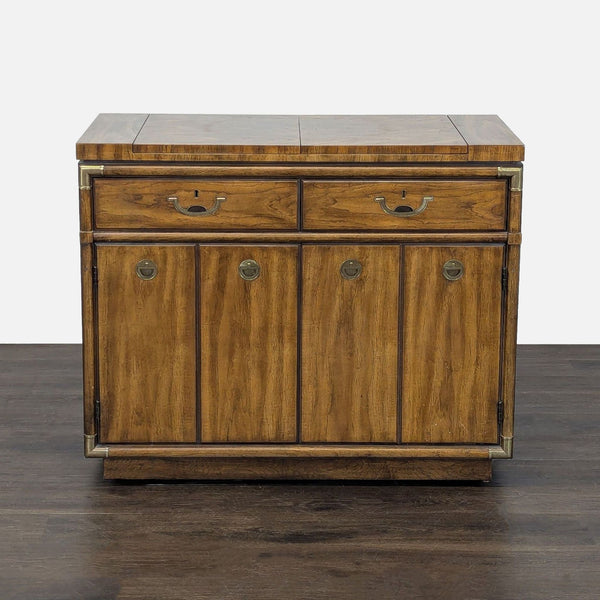 1. 1970s Drexel sideboard with fruitwood, brass accents, flip-top leaves, and ample storage space.