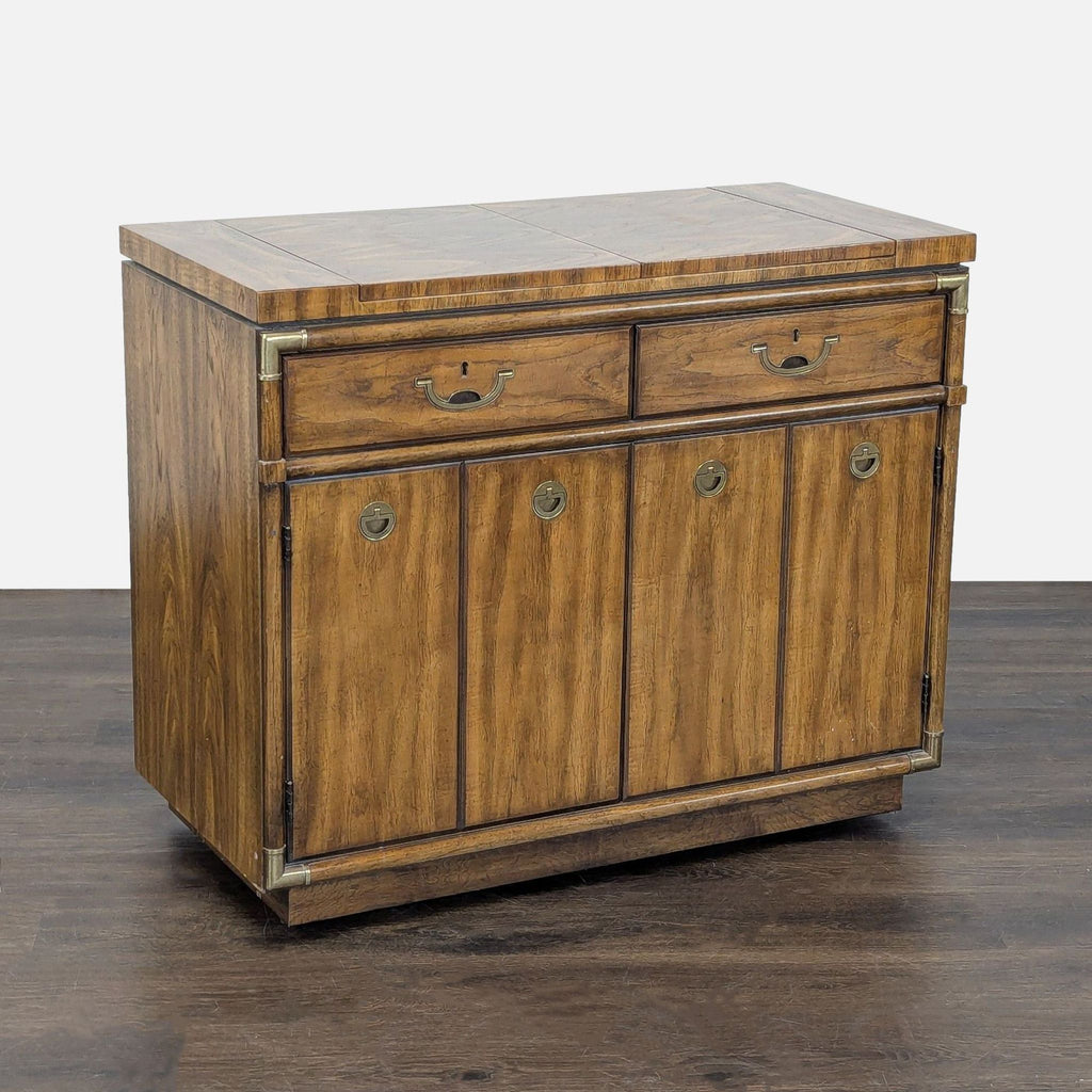 3. Campaign-style Drexel sideboard, expandable surface, warm wood finish, and concealed serving leaves.