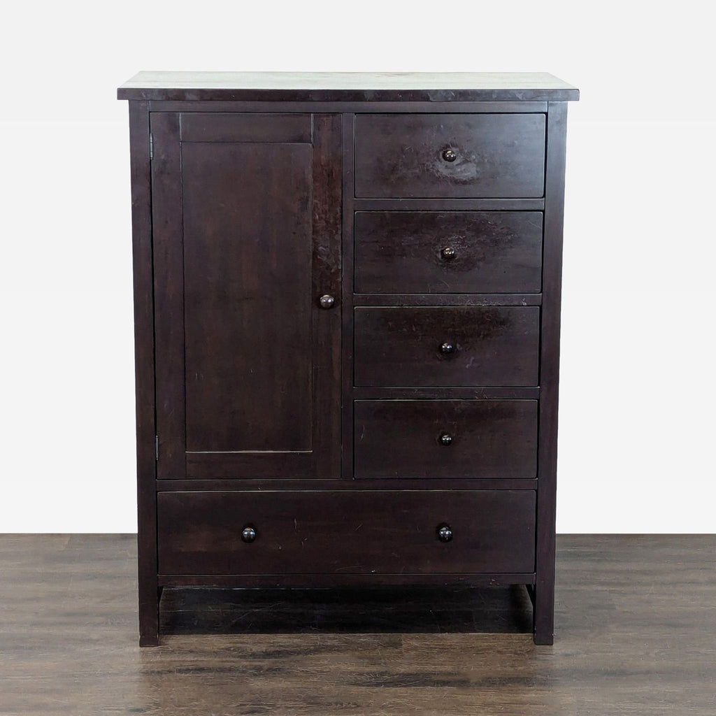 Pottery Barn dark wood dresser with four drawers, a large bottom drawer, and a side cabinet for storage.
