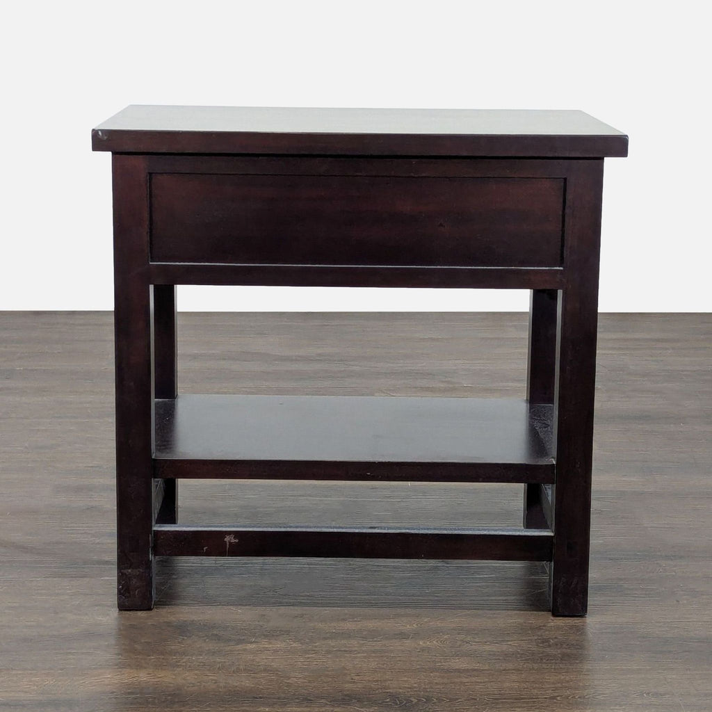 End table from Pottery Barn in dark wood, includes two storage drawers and a shelf for extra space.