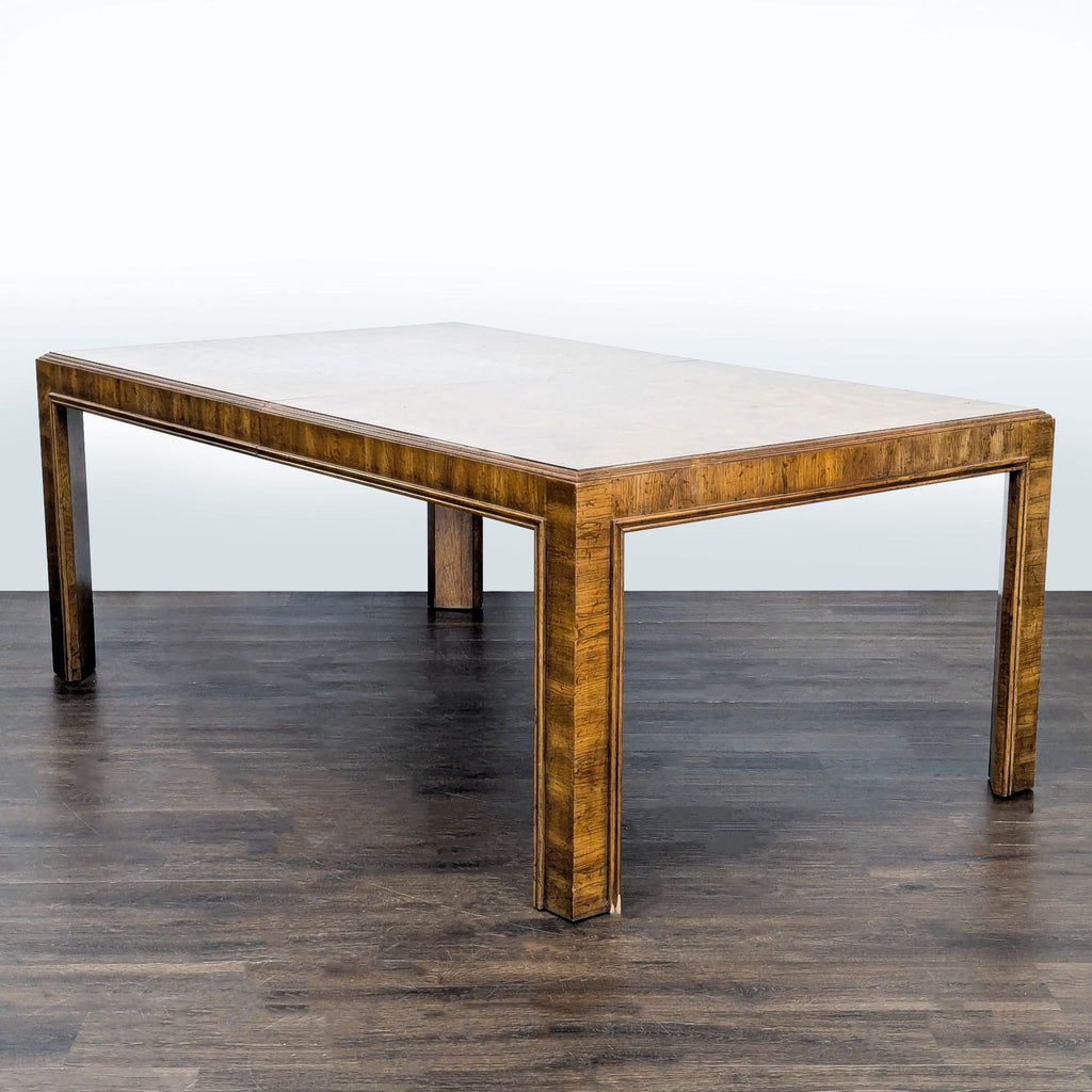 1. Rectangular Drexel Heritage dining table with a wood finish, featuring clean lines and sturdy legs.