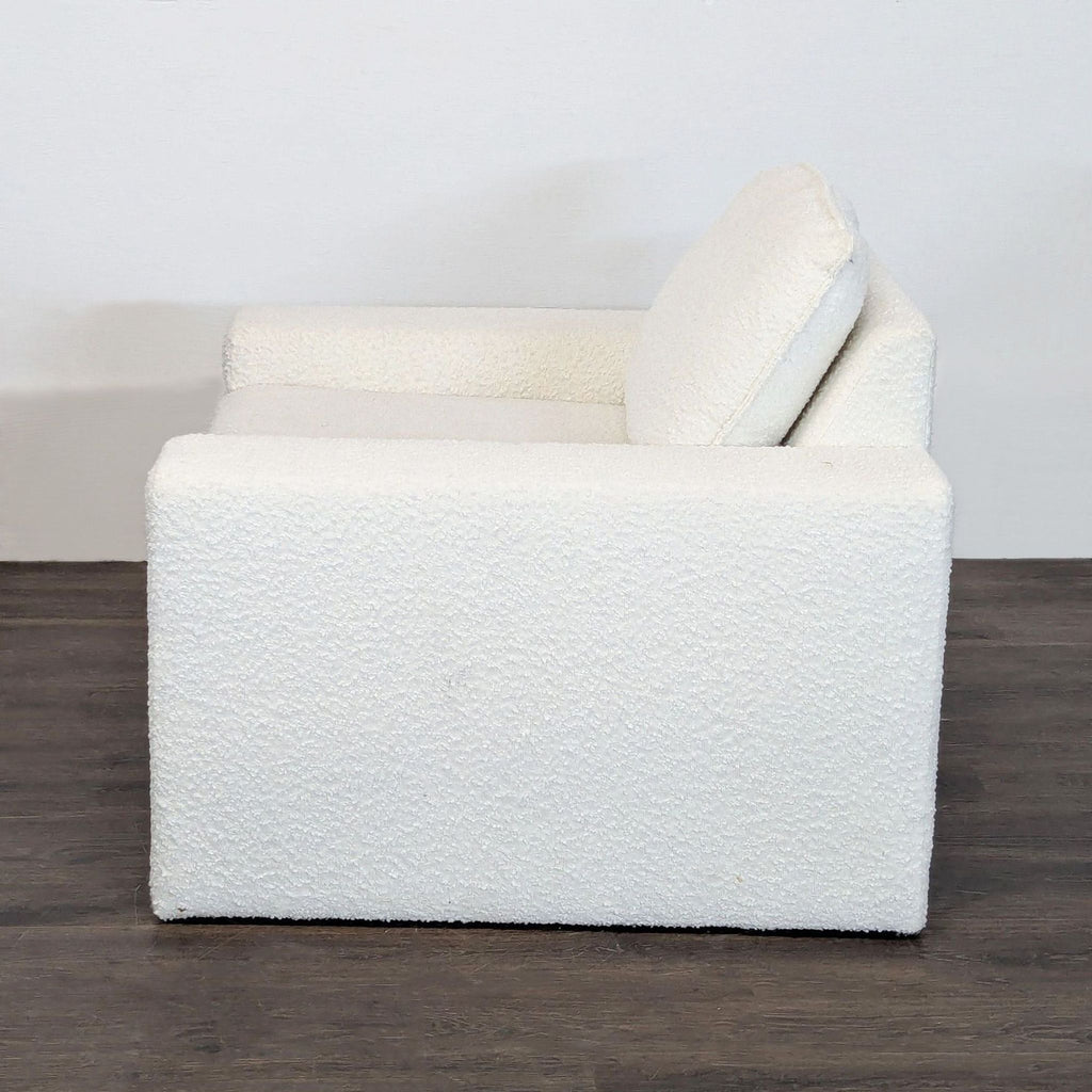 Cozy white lounge chair from TOV, designed with soft fabric and roomy arms for modern or casual spaces.