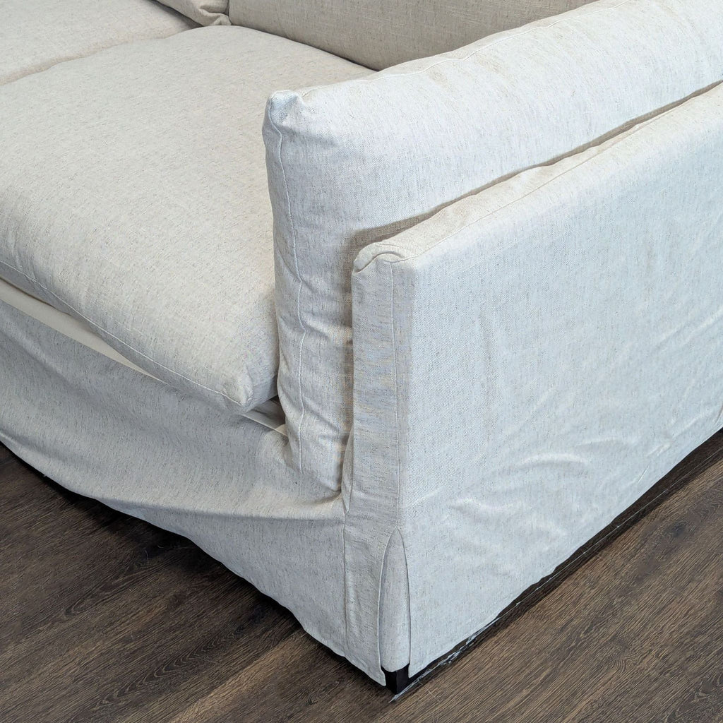 Contemporary Four Hands loveseat with spacious seating and a cozy look that suits various room styles.