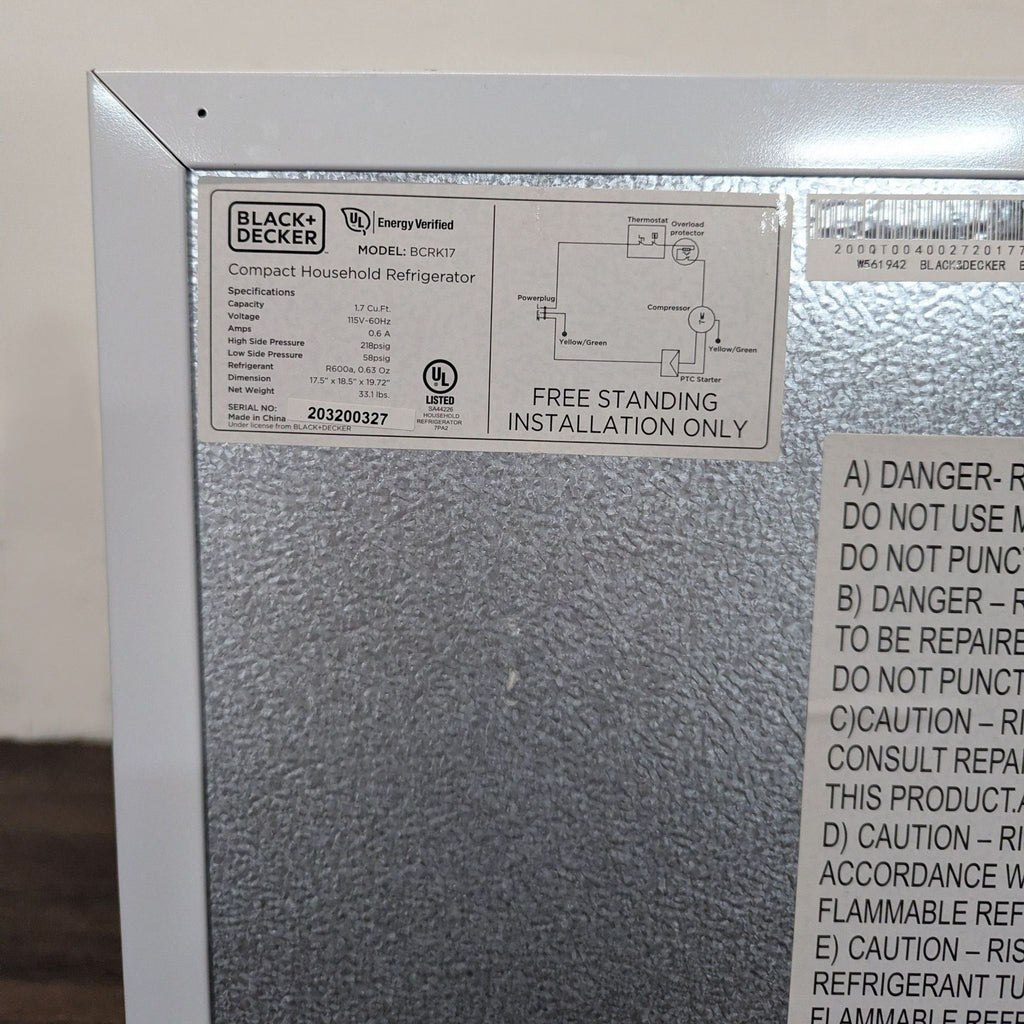 Black + Decker mini refrigerator in clean white finish, providing reliable cooling for drinks and snacks.