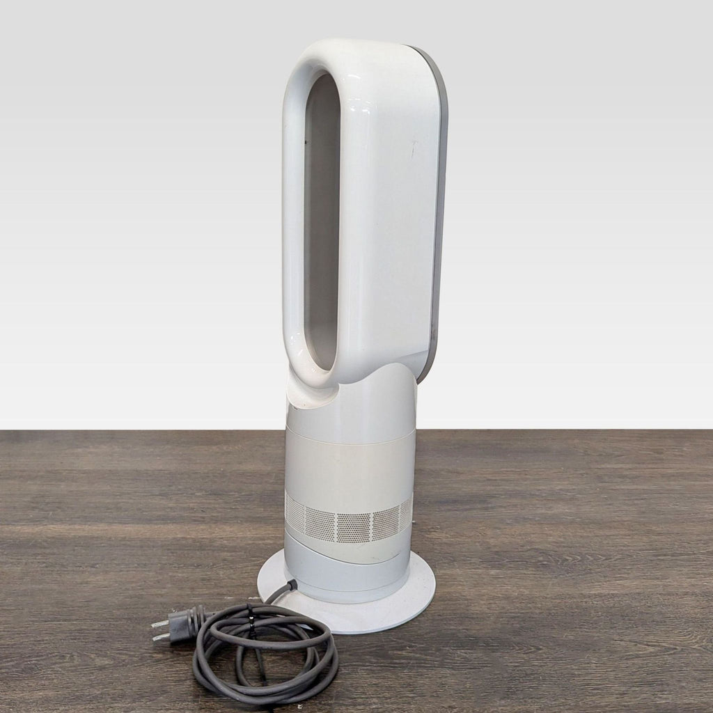 3. Dyson branded AC & fan appliance, compact and minimal, for home or office use.