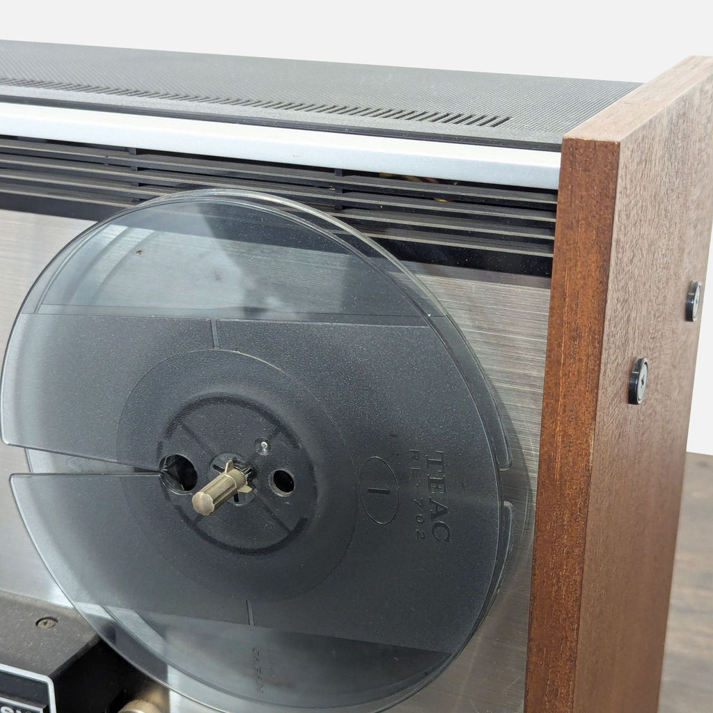 1. TEAC branded black audio equipment device with front control panel, belonging to Audio Equipment category.