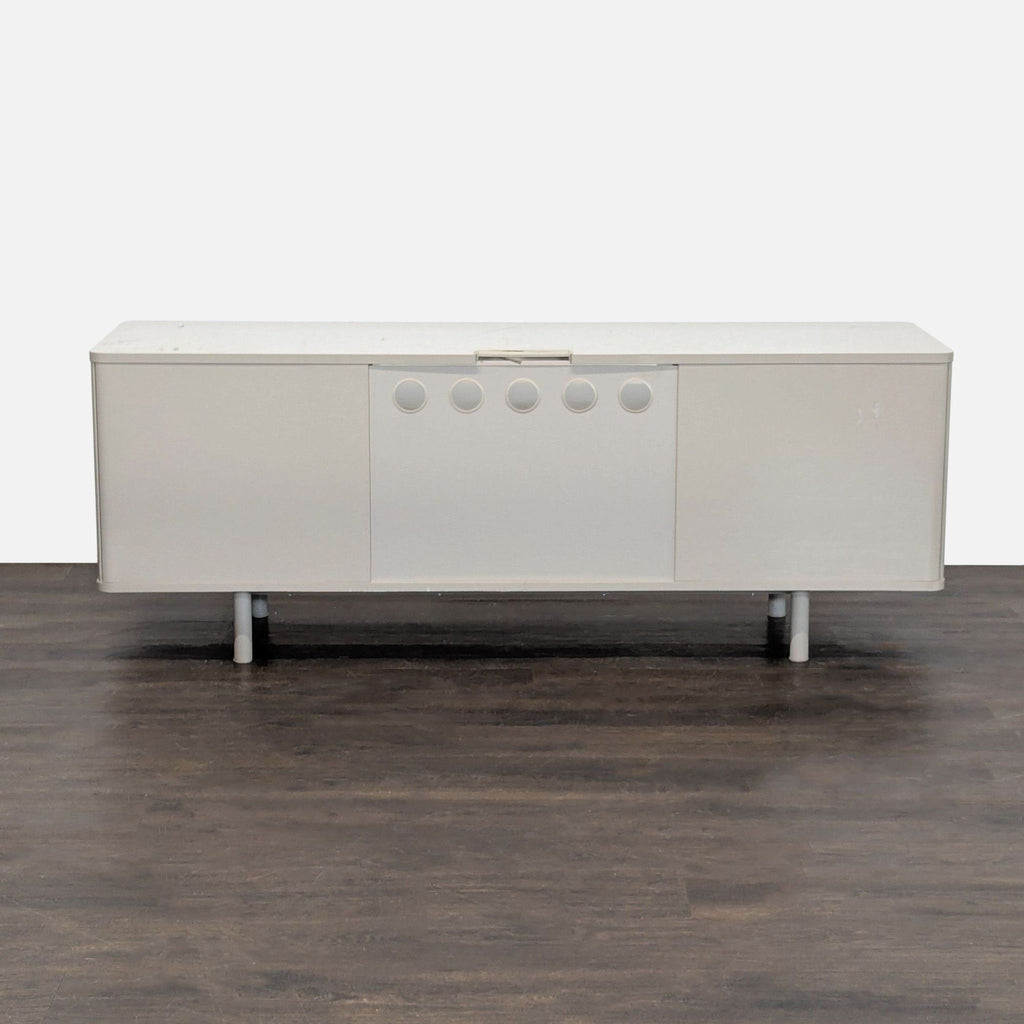 Ikea TV unit with spacious cabinets, open shelf for electronics, and a wide drawer, all in a modern design.