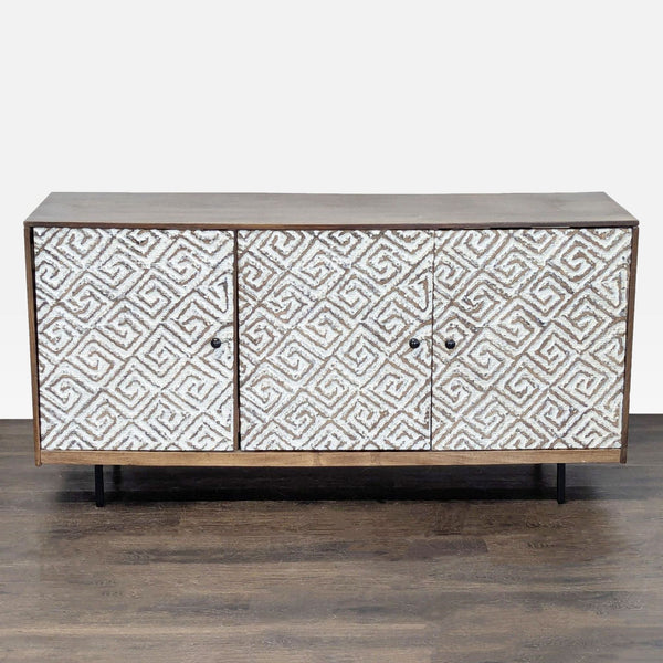 Flush-mount doors with carved Greek key design entertainment center from Ashley Furniture; wood finish and ample storage.