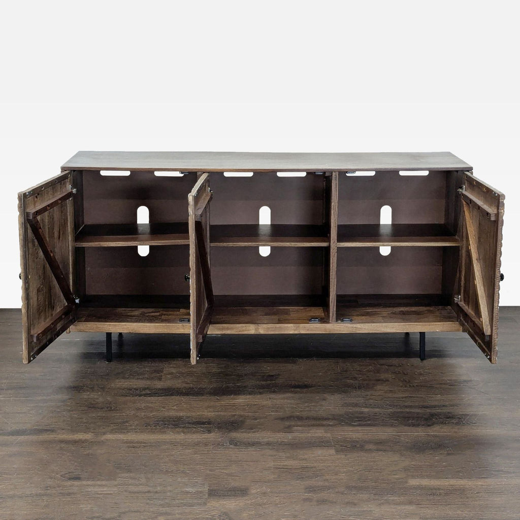 Ashley Furniture entertainment center featuring Greek key carved doors and three interior shelves for organized storage.