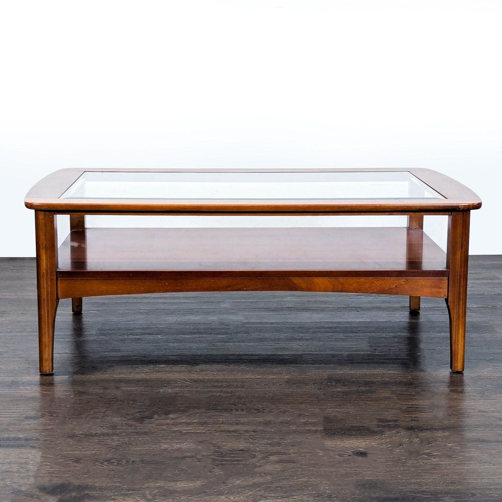 Riverside Furniture coffee table with beveled glass top and bottom shelves.  