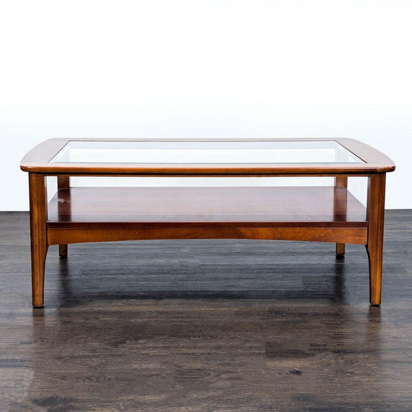Riverside Furniture coffee table with beveled glass top and bottom shelves.  