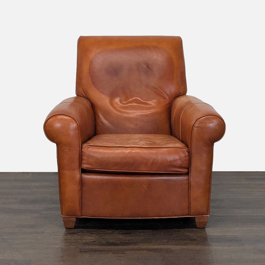 1. Front view of a brown leather Ethan Allen lounge chair with rolled arms and a cushioned seat, classic design.  