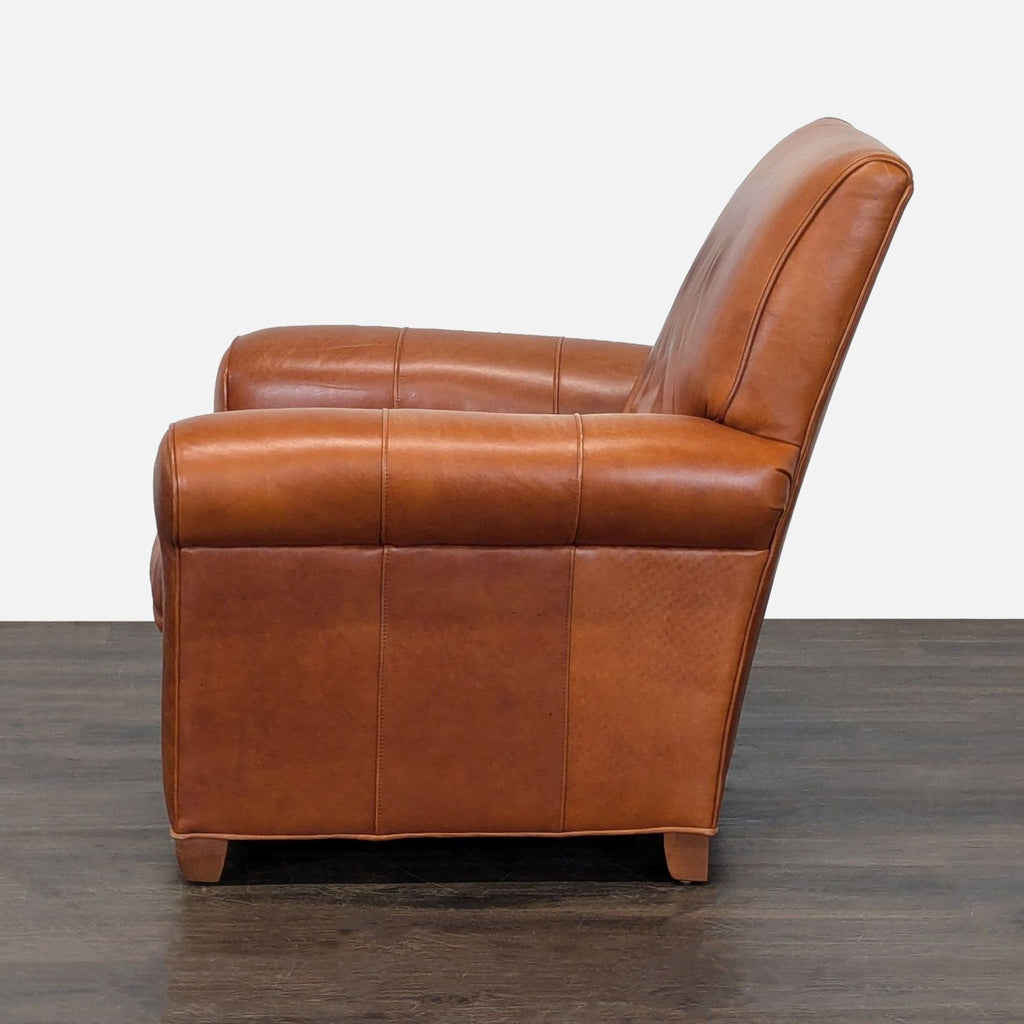 3. Side profile of a sturdy Ethan Allen brown leather lounge chair with elegant rolled arms and classic lines.