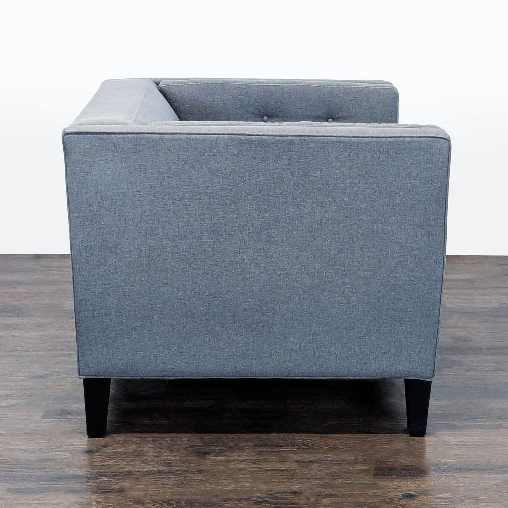 2. Jonathan Louis lounge sofa, upholstered and spacious, designed for comfort in casual spaces.
