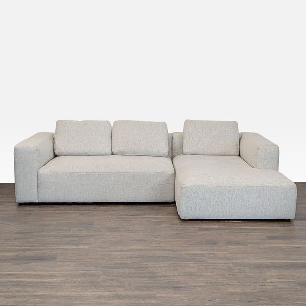 Modern Foundry Furniture sectional with spacious chaise, wide armrests, and deep seats in excellent condition.  