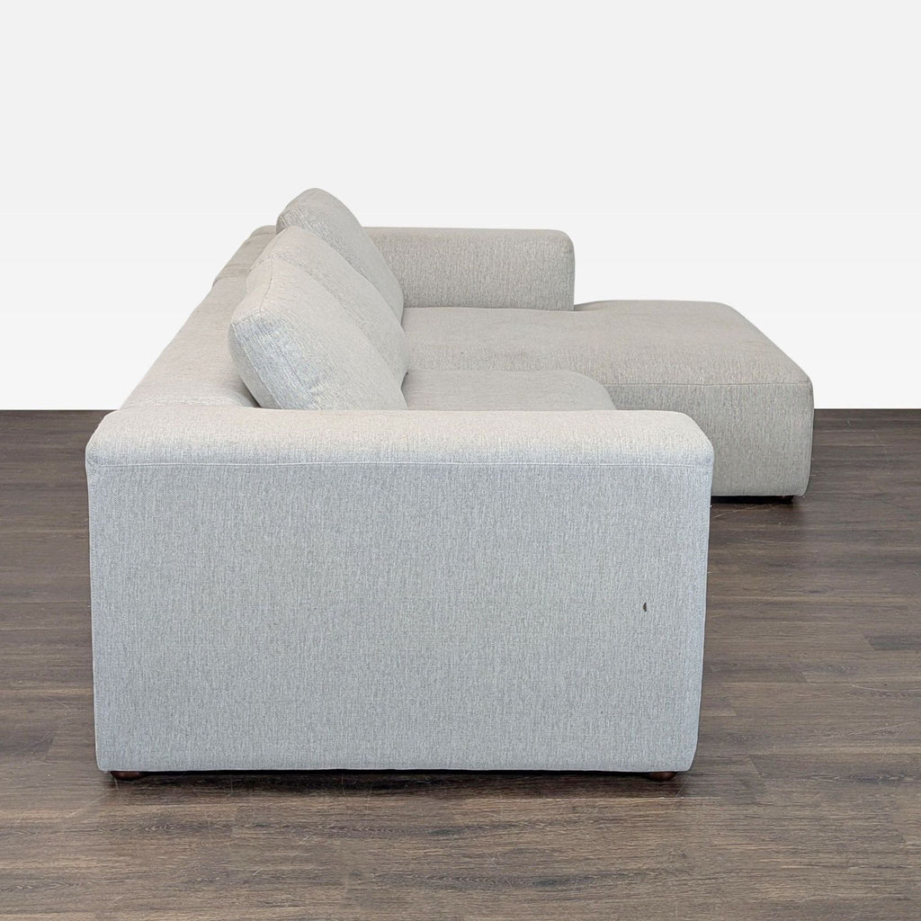 Gently used Foundry sectional sofa featuring a clean design, roomy chaise, and minimal signs of wear.  