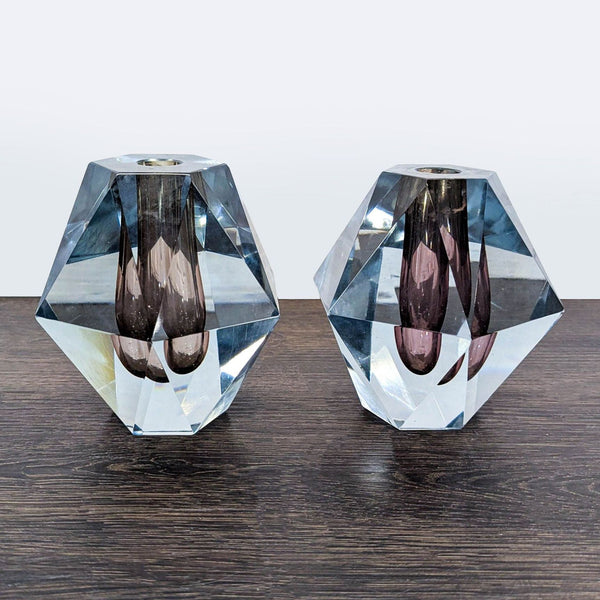 Pair of mid-century Italian crystal candle holders by Fontana Arte with brass inserts and faceted geometric design.  