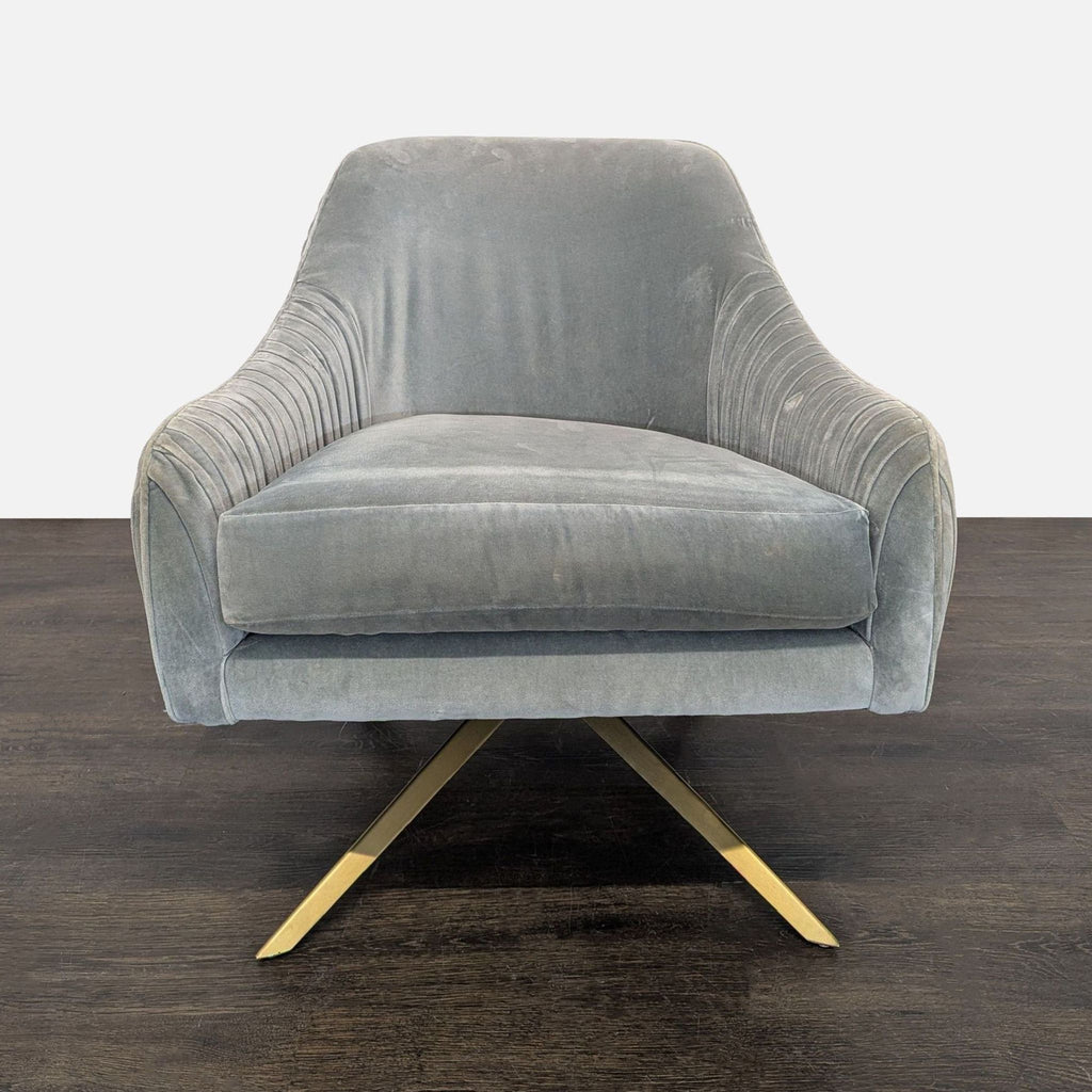 West Elm lounge chair in gray velvet with gold metal base and ribbed sides, modern and stylish.