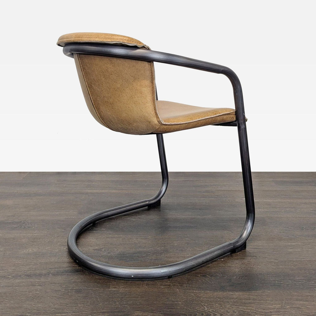 Sleek lounge chair featuring soft brown leather upholstery and a sturdy, curved black metal base.