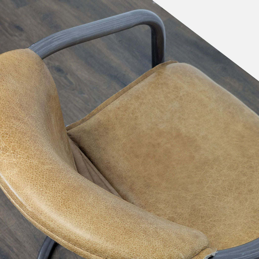Industrial Style Lounge Chair with Metal Frame and Brown Leather Seat