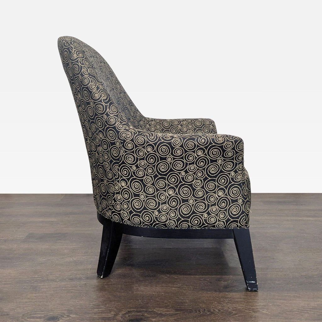 Modern lounge chair featuring black and tan patterned fabric, cushioned seat, and sturdy wooden legs.