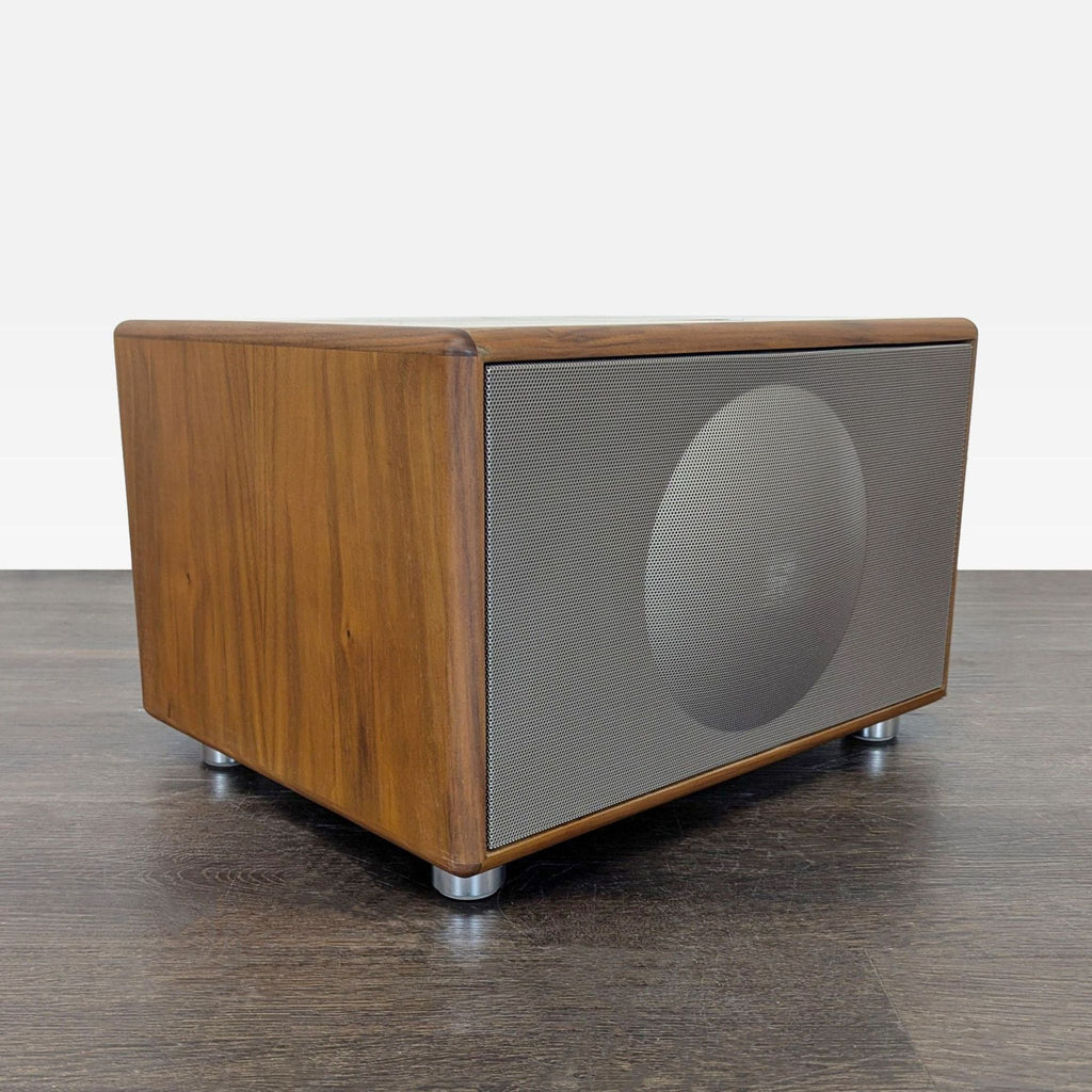 Sleek wireless audio speaker from Geneva, offering crisp sound and long battery life for travel or home.