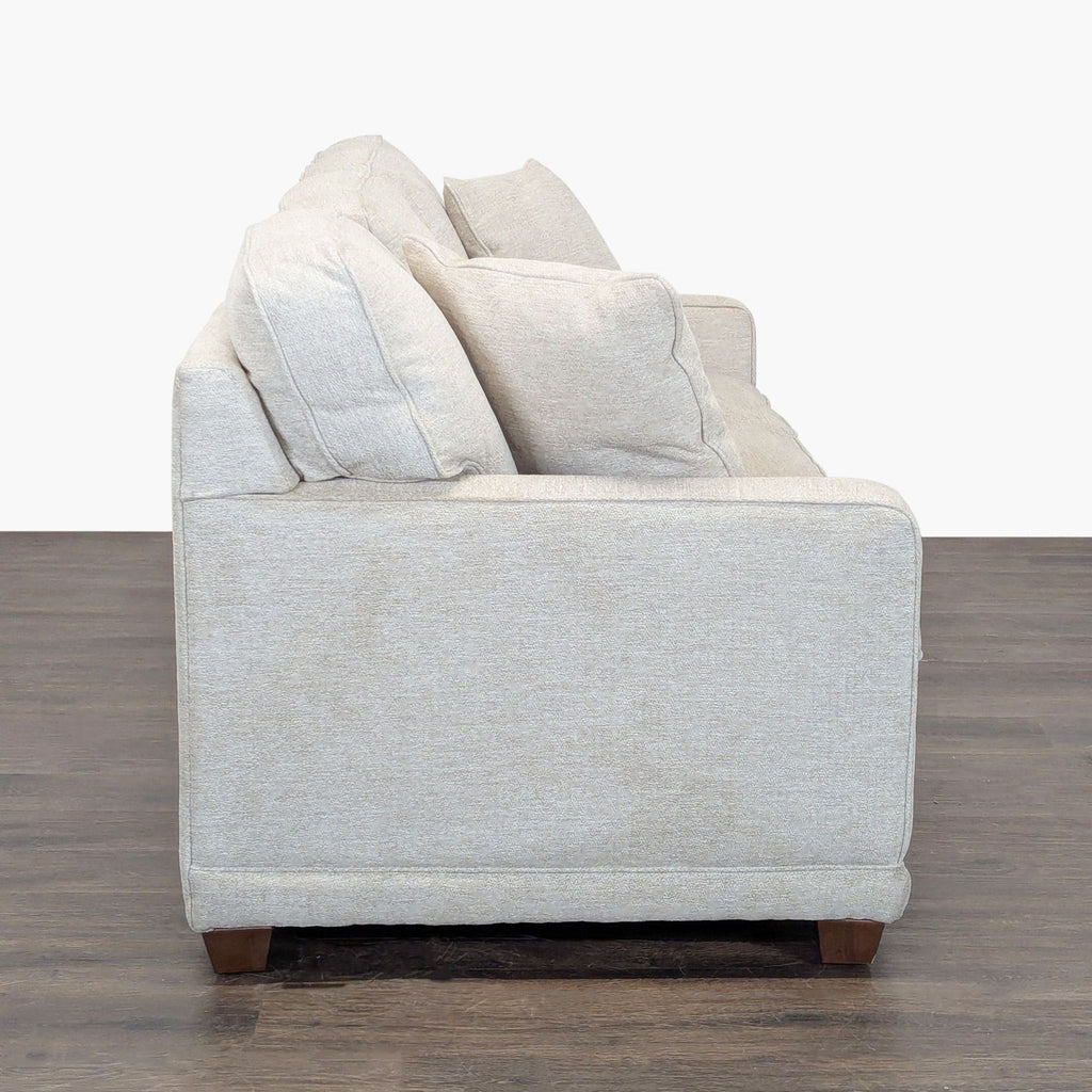 3. Modern 3-seat La-Z-Boy sofa, designed for comfort with soft upholstery and supportive armrests.