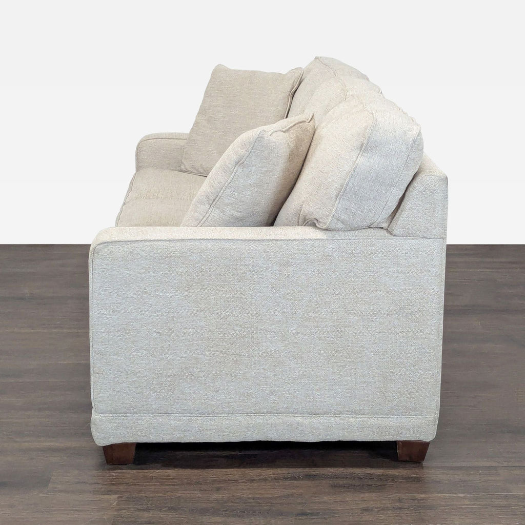 1. La-Z-Boy 3-seat sofa with plush cushioning and a modern design, ideal for spacious living rooms.  