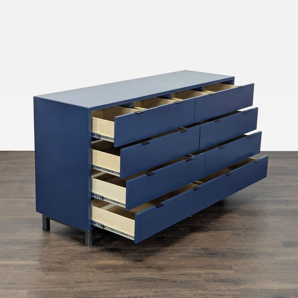 Sleek Room & Board dresser in navy finish, features 10 smooth-glide drawers and contemporary design.