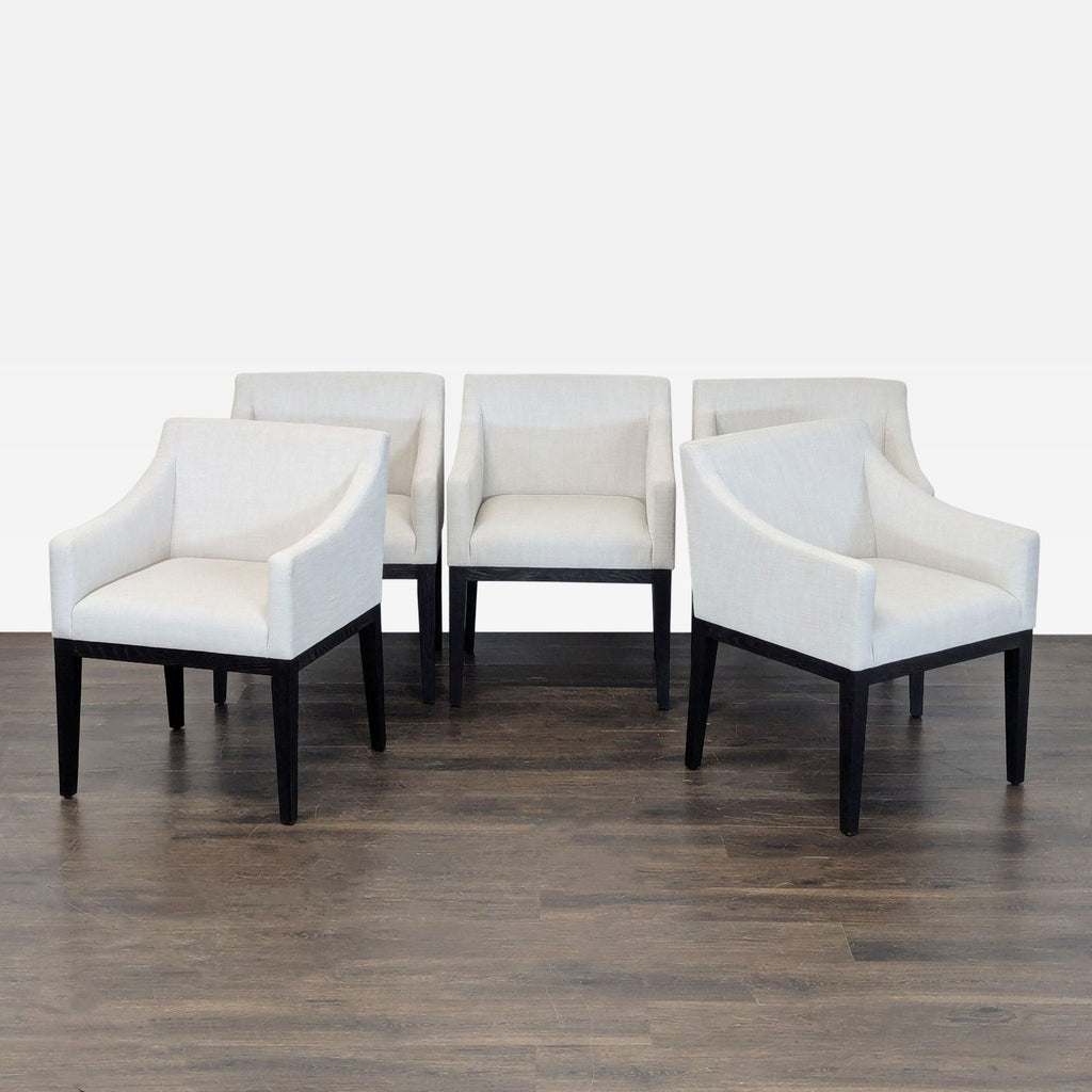 Restoration Hardware/Kathy Kuo Home dining set: round wood table and four cozy cream chairs for gatherings.