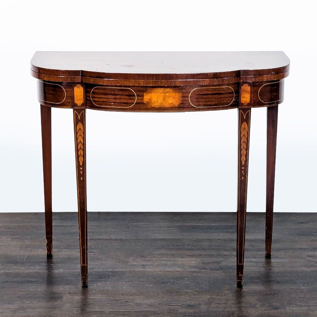 1. Demilune folding table with inlaid design shown closed and partially open for expanded use.  