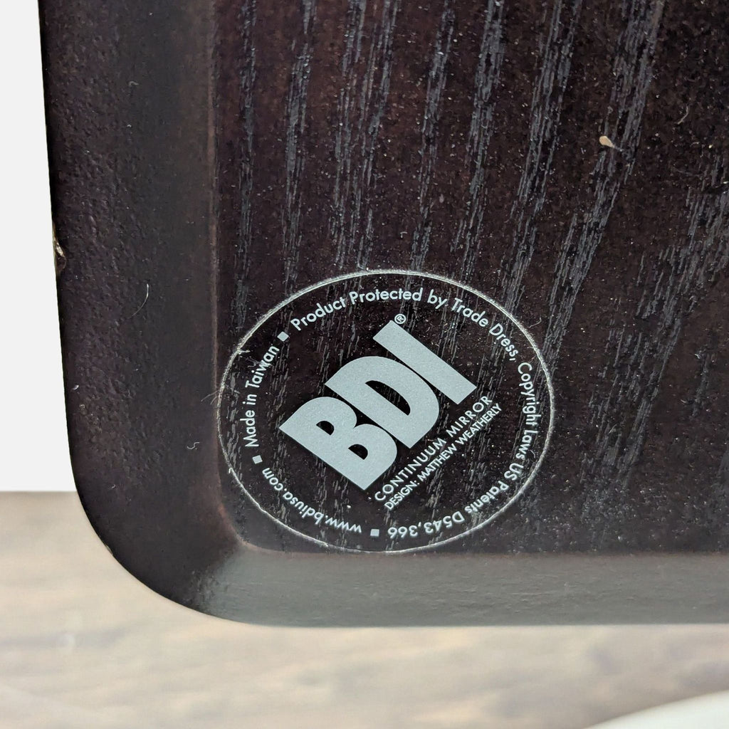 BDI Continuum swivel mirror in solid wood frame, designed for modern interiors with smooth tilt adjustment.