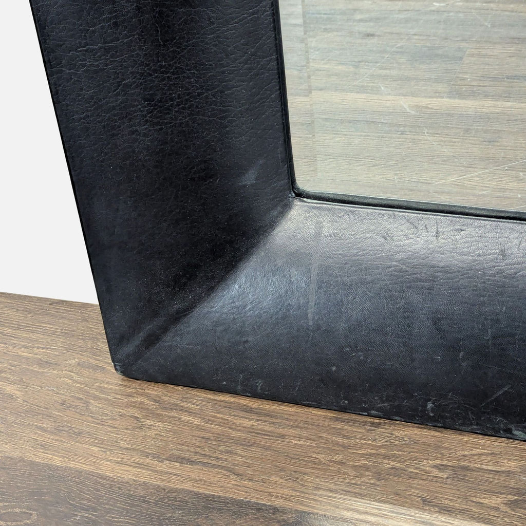 2. Elegant Crate & Barrel mirror featuring a simple design, perfect for entryways or living rooms.