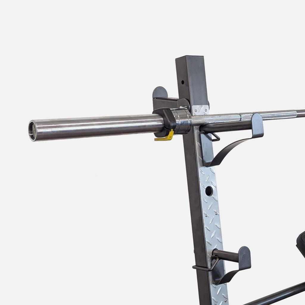 Marcy gym bench with adjustable backrest and padded seat, designed for home strength training.
