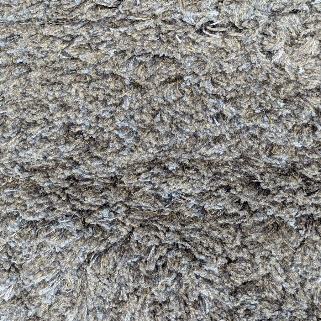 Plush gray rug with a warm, durable surface, great for offices or relaxing spaces, easy to maintain.