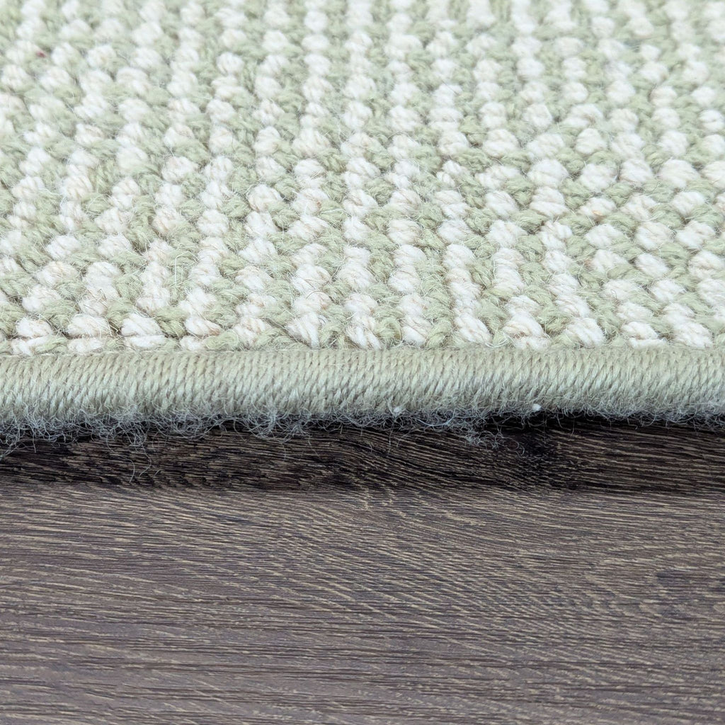 Soft, durable area rug in a simple design, easily complements various decor styles and spaces.