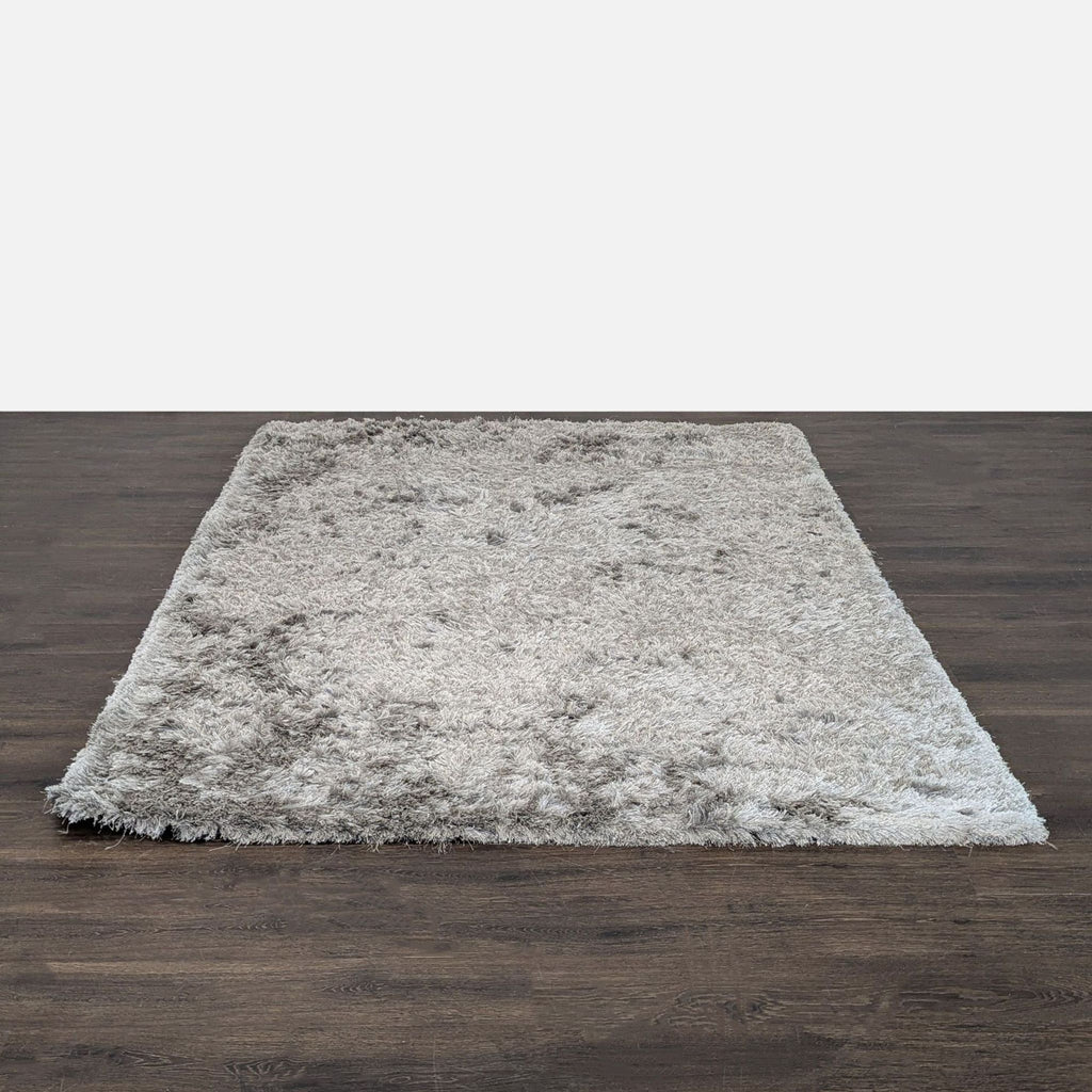 Light gray nuLOOM shag rug with a plush high pile, gently used and in great condition.