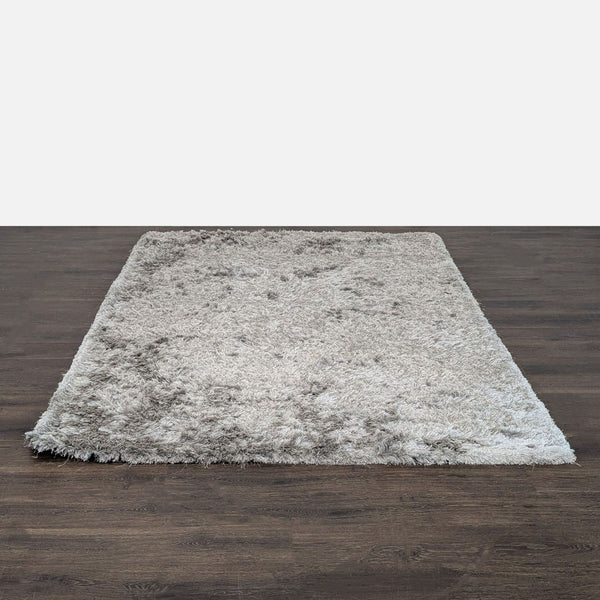 Light gray nuLOOM shag rug with a plush high pile, gently used and in great condition.